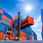 ontainer stacker crane lifting up stacking container box in yard, Container loading cargo freight in import and export business logistic company, Industry logistic and transportation