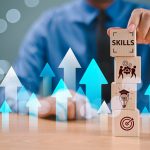 Skill competency development concept. Up new ability skill training for technology evolution. Leadership thinking upskill. Hand hold wooden cube, soft skill digital icon. Education learning talent